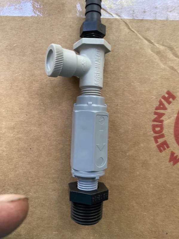 Injection check valve and fitting assembly