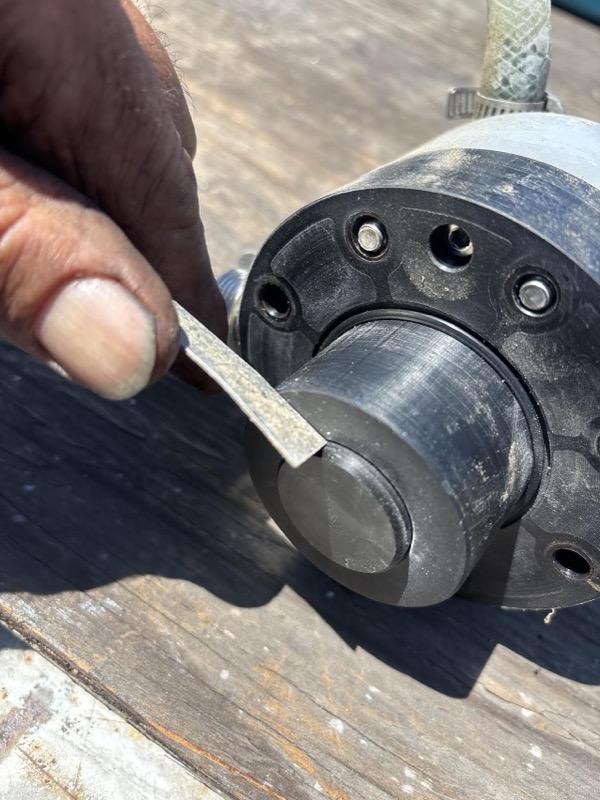 Drive coupling key being fitted during pump service